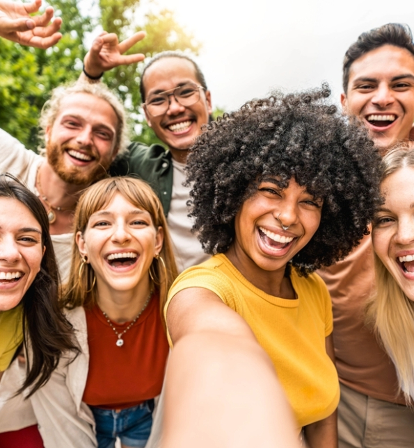 group of younger people taking a selfie