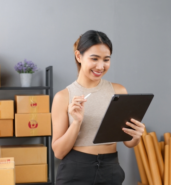 woman in office on tablet