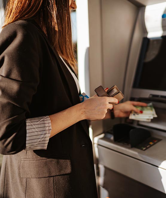 Woman using an ATM